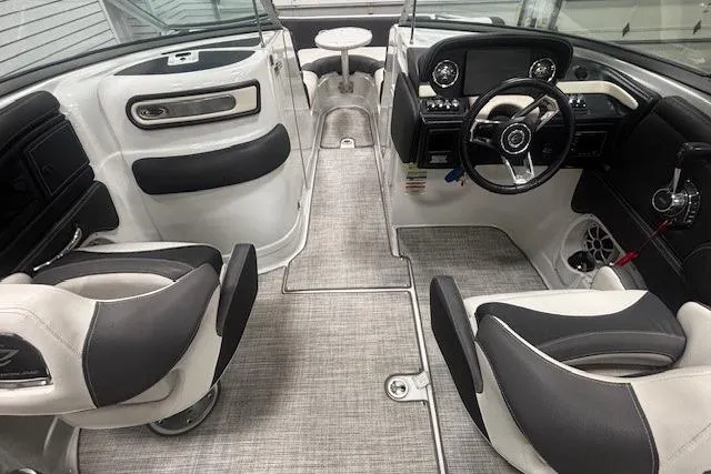 Slide: The Image of Interior of a 2019 Crownline Eclipse E255 SURF boat with modern seating and dashboard. - 20