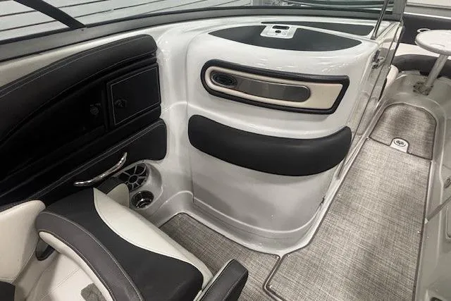 Slide: The Image of 2019 Crownline Eclipse E255 SURF boat interior with sleek seating and modern design. - 24