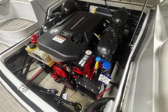 Slide: The Image of 2019 Crownline Eclipse E255 SURF boat engine compartment with Volvo Penta engine. - 30