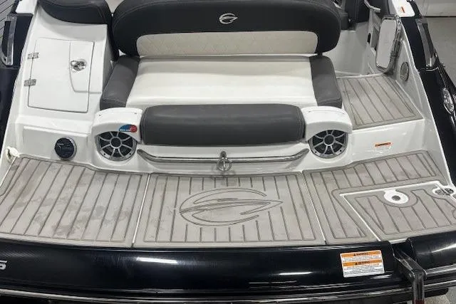 Slide: The Image of 2019 Crownline Eclipse E255 SURF boat rear seating and deck area. - 37