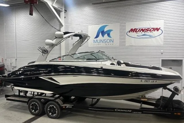 Slide: The Image of 2019 Crownline Eclipse E255 SURF boat on trailer in showroom setting. - 41