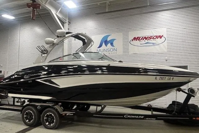 Slide: The Image of 2019 Crownline Eclipse E255 SURF boat on trailer in showroom setting. - 42