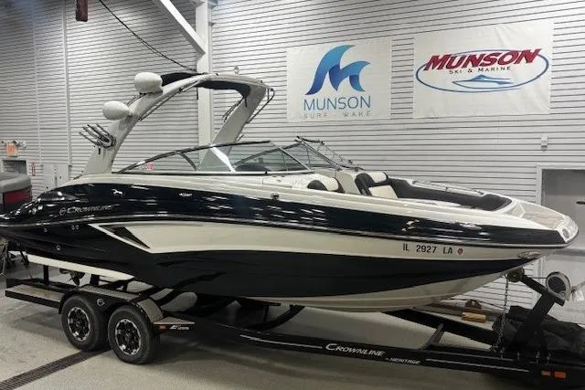 Slide: The Image of 2019 Crownline Eclipse E255 SURF boat on trailer in showroom. - 46