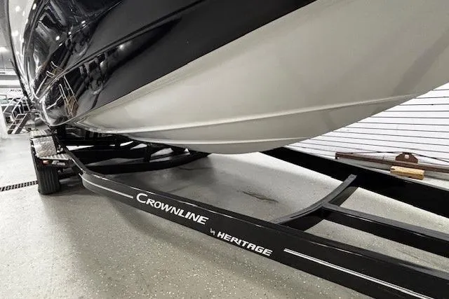 Slide: The Image of 2019 Crownline Eclipse E255 SURF boat on Heritage trailer in showroom. - 50