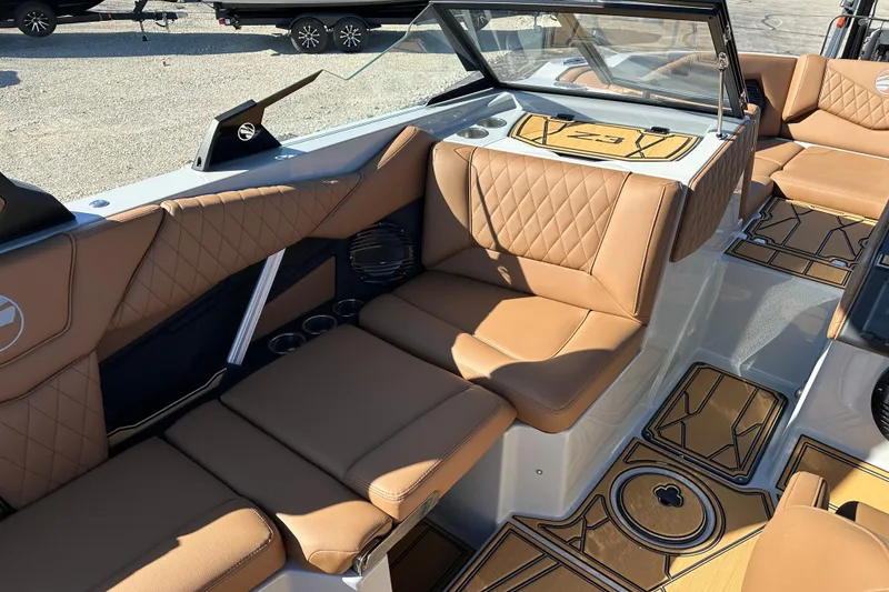 Slide: The Image of 2026 Tigé Z3 boat interior with tan leather seating and stylish flooring. - 12