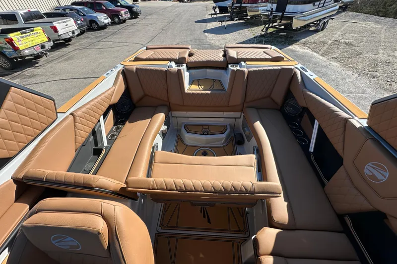 Slide: The Image of Luxurious interior of 2026 Tigé Z3 boat with tan leather seating and modern design. - 14