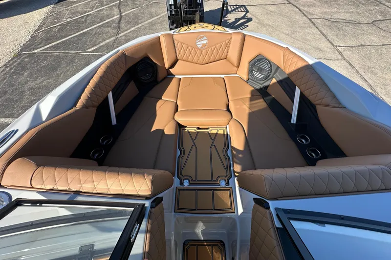 Slide: The Image of 2026 Tigé Z3 boat interior with tan leather seating and cup holders. - 18