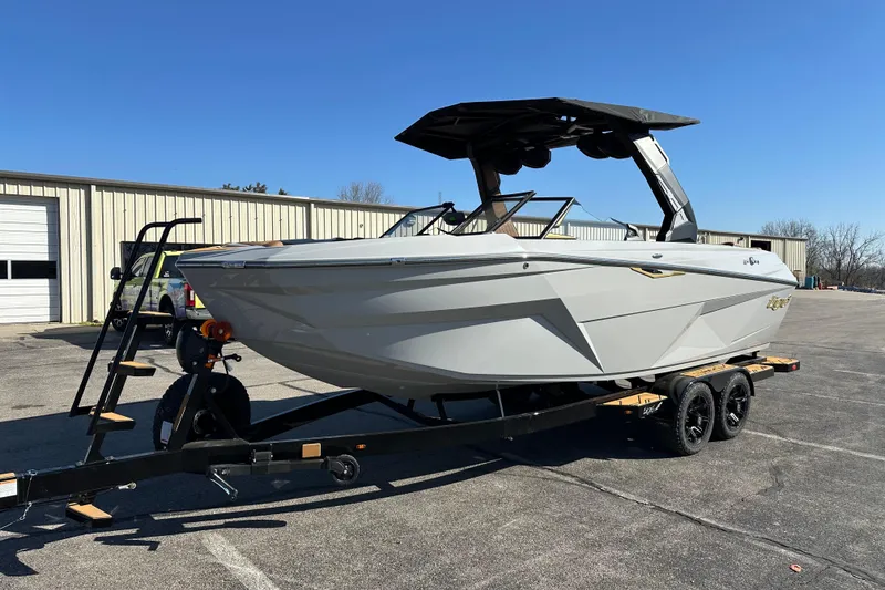 Slide: The Image of 2026 Tigé Z3 boat on trailer in sunny outdoor setting. - 7