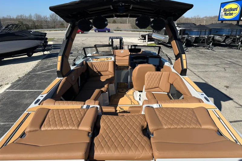 Slide: The Image of 2026 Tigé Z3 boat with luxurious tan interior and spacious seating at Blackbeard Marine. - 9