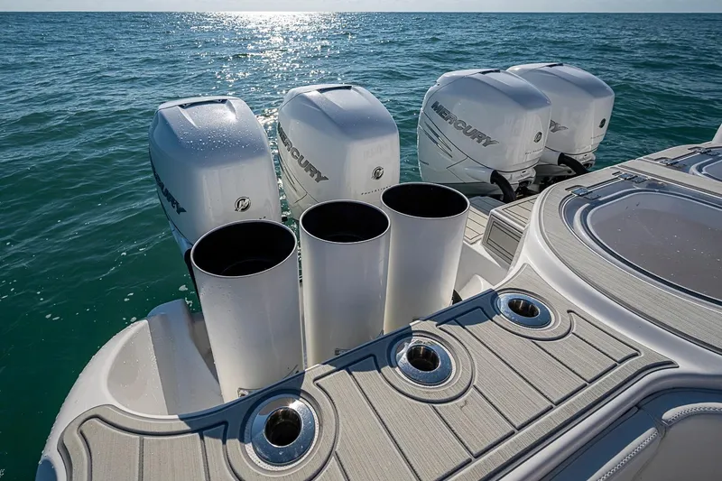 Slide: The Image of 2018 Invincible 40 Catamaran with Mercury outboard engines on open water. - 15