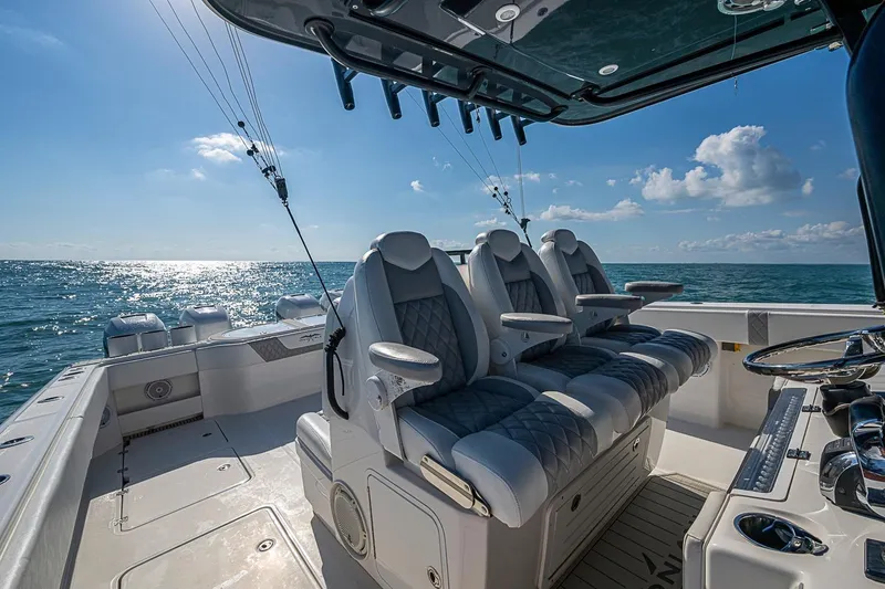 Slide: The Image of Luxurious 2018 Invincible 40 Catamaran interior with ocean view and plush seating. - 28