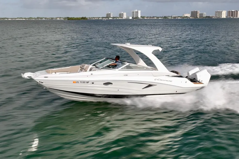 The Image of 2020 Crownline Eclipse E305 XS speeding on the water. - 0