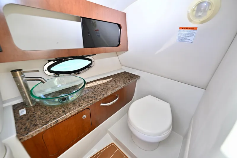 Slide: The Image of Luxurious bathroom in 2020 Crownline Eclipse E305 XS boat with modern fixtures. - 16