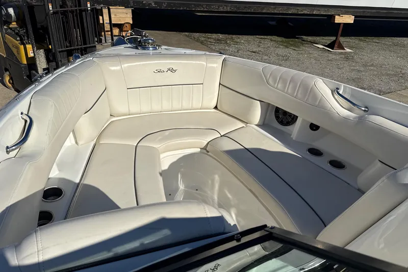 Slide: The Image of 2007 Sea Ray 250 Select EX boat interior with white leather seating. - 16