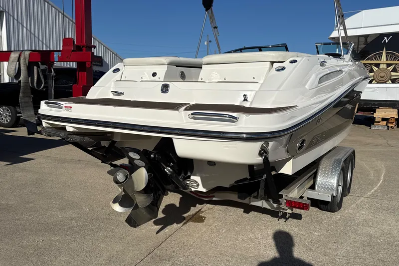 Slide: The Image of 2007 Sea Ray 250 Select EX boat on trailer, rear view, outdoor setting. - 3