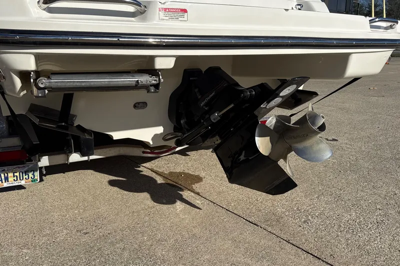 Slide: The Image of Rear view of a 2007 Sea Ray 250 Select EX boat with propeller and outdrive. - 9