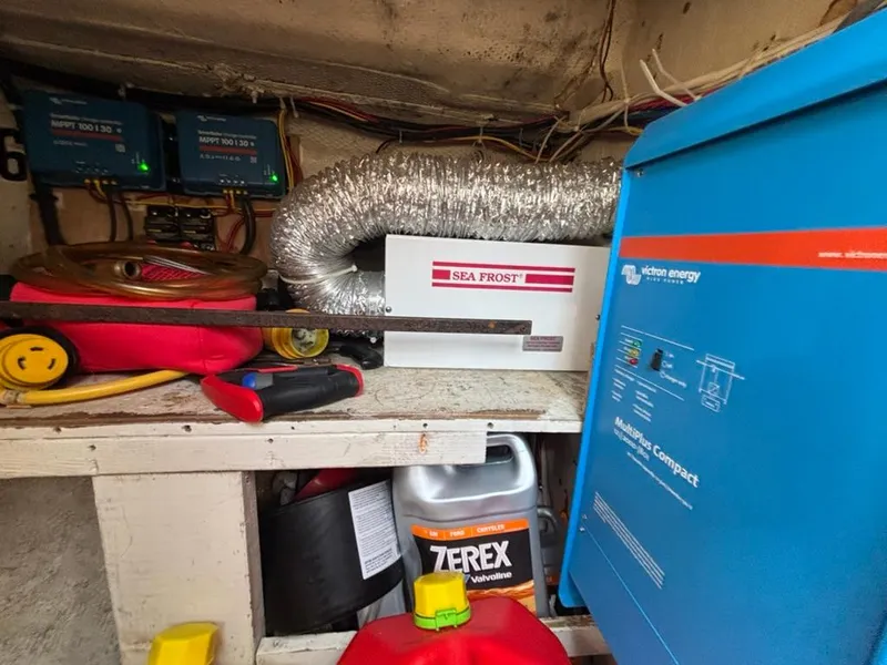 Slide: The Image of Boat engine room with Victron Energy and Sea Frost equipment. - 24
