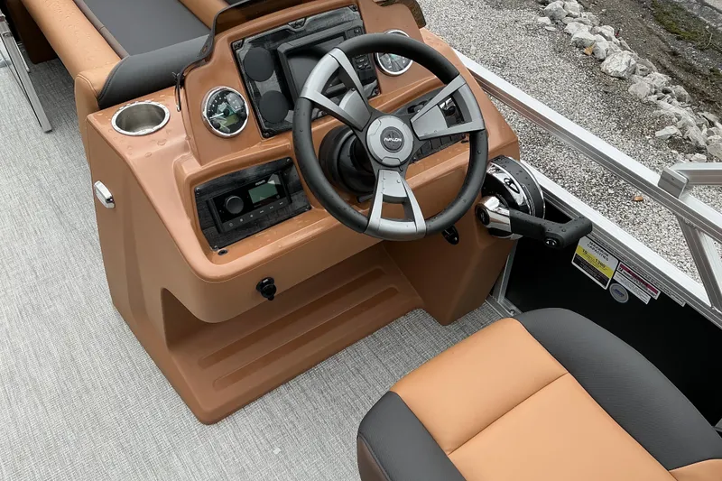 Slide: The Image of Steering console of 2026 Avalon Venture Rear Fish 21' boat with modern controls. - 8