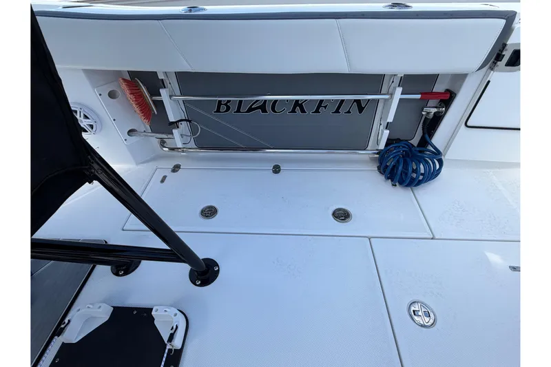 Slide: The Image of 2018 Blackfin 242 CC boat anchor compartment with chain and rope storage. - 19