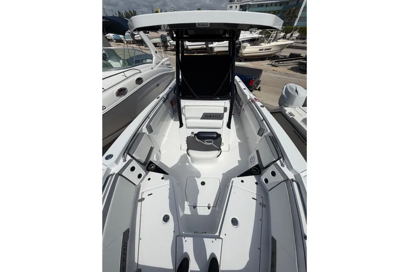 Slide: The Image of Control panel of a 2018 Blackfin 242 CC boat with switches and voltage indicators. - 23