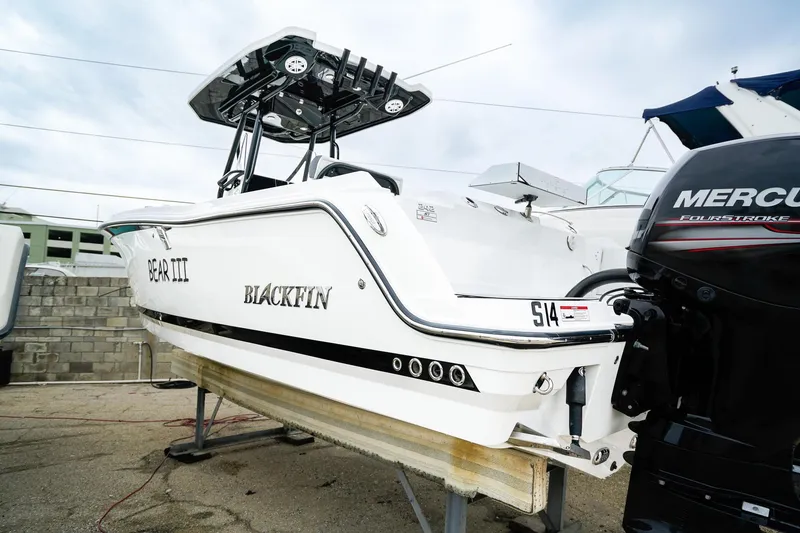 Slide: The Image of 2018 Blackfin 242 CC boat with Mercury engine on display. - 26