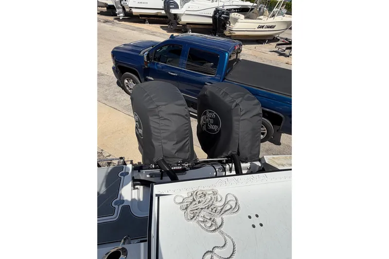 Slide: The Image of 2018 Blackfin 242 CC boat interior with seating and storage compartments. - 7