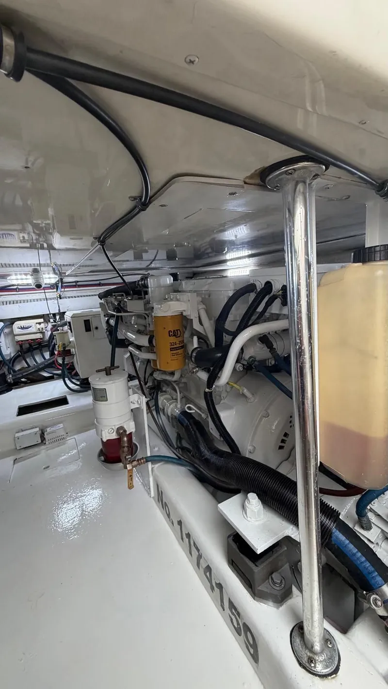 Slide: The Image of Engine room of 2006 Egg Harbor 37 Convertible with cables and filters. - 31