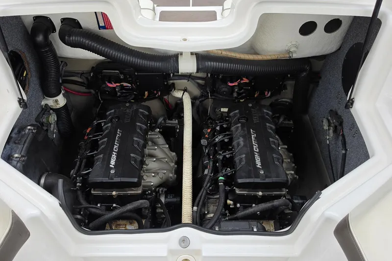 Slide: The Image of Engine compartment of 2014 Yamaha Boats 242 Limited, featuring dual high-output engines. - 3