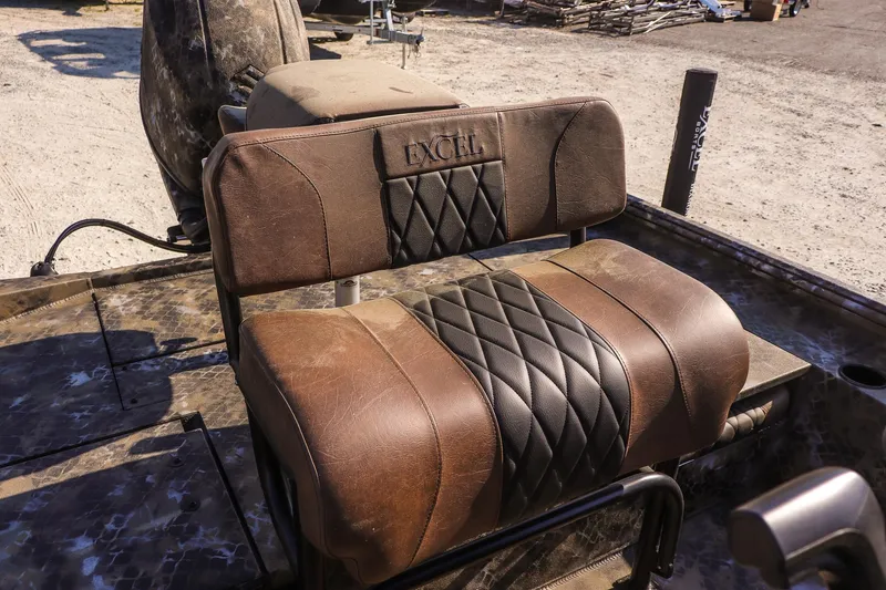 Slide: The Image of Brown leather seat on 2026 Excel 203 Bay Pro Elite boat. - 15