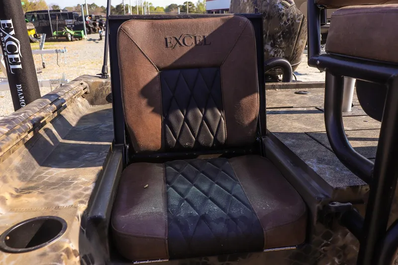 Slide: The Image of 2026 Excel 203 Bay Pro Elite boat seat with diamond-patterned upholstery. - 16