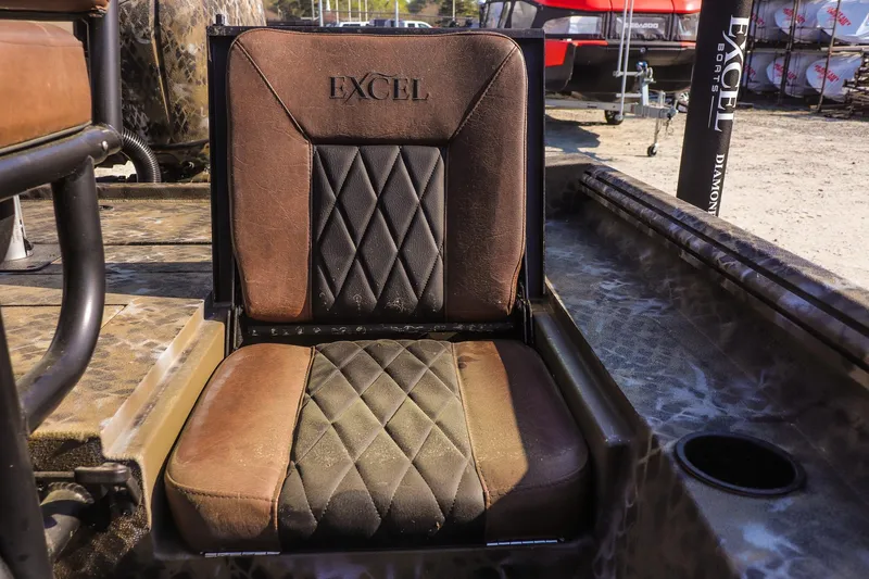 Slide: The Image of 2026 Excel 203 Bay Pro Elite boat seat with diamond-patterned upholstery. - 17