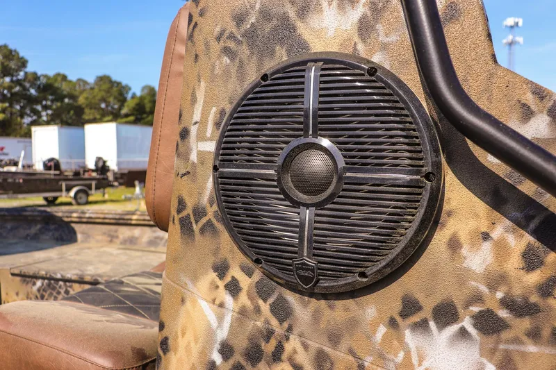 Slide: The Image of Camouflage speaker on 2026 Excel 203 Bay Pro Elite boat, outdoor setting. - 19