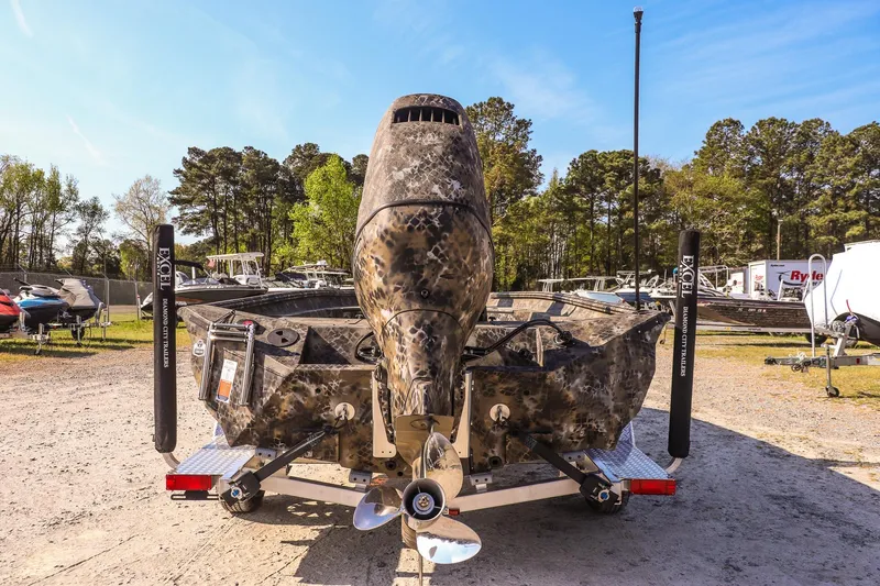 Slide: The Image of 2026 Excel 203 Bay Pro Elite boat with camouflage design on a trailer. - 6