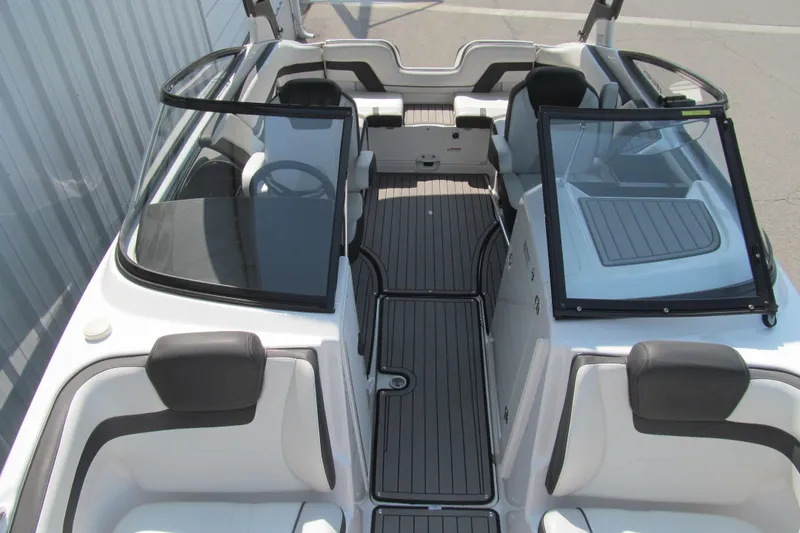 Slide: The Image of 2018 Yamaha Boats 242 Limited S interior with sleek seating and modern design. - 13