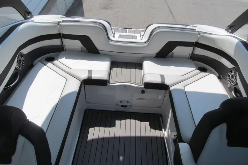 Slide: The Image of 2018 Yamaha Boats 242 Limited S interior with sleek seating and modern design. - 15
