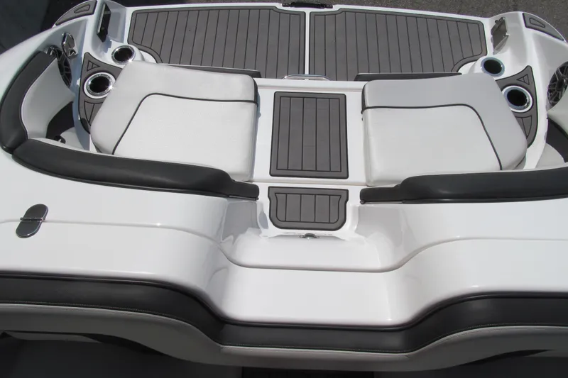 Slide: The Image of 2018 Yamaha Boats 242 Limited S, featuring sleek white seating and modern design. - 16