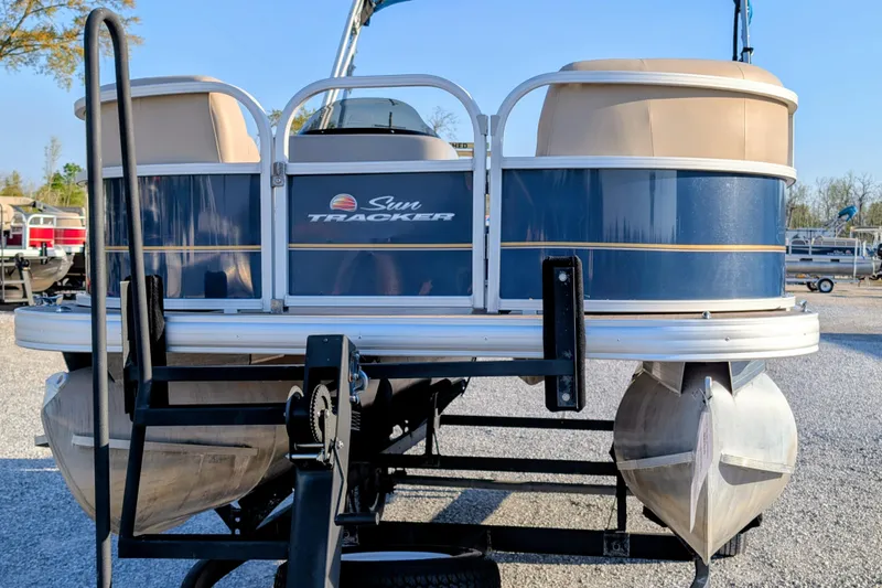 Slide: The Image of 2020 Sun Tracker Party Barge 18 pontoon boat on trailer, front view. - 4