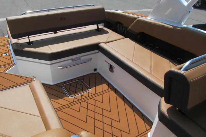 Slide: The Image of Luxurious seating area on 2026 Cobalt R8 boat with tan upholstery and stylish flooring. - 18