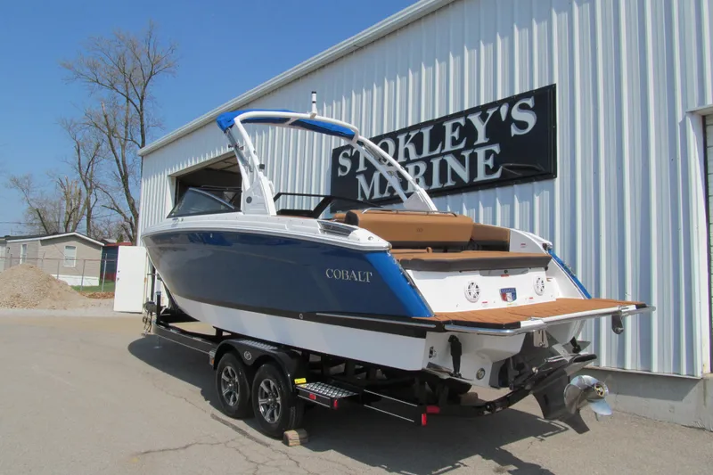 Slide: The Image of 2026 Cobalt R8 boat on trailer at Stokley's Marine dealership. - 3