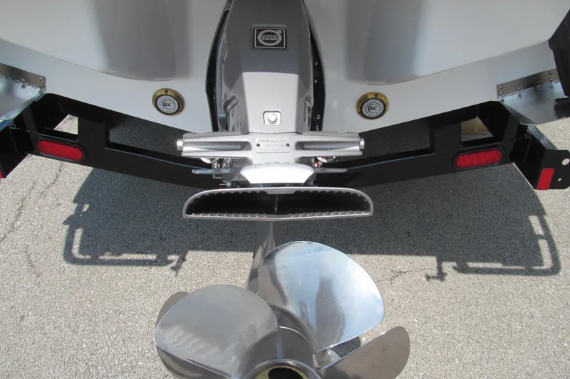 Slide: The Image of Rear view of 2026 Cobalt R8 boat with propeller and trailer. - 5