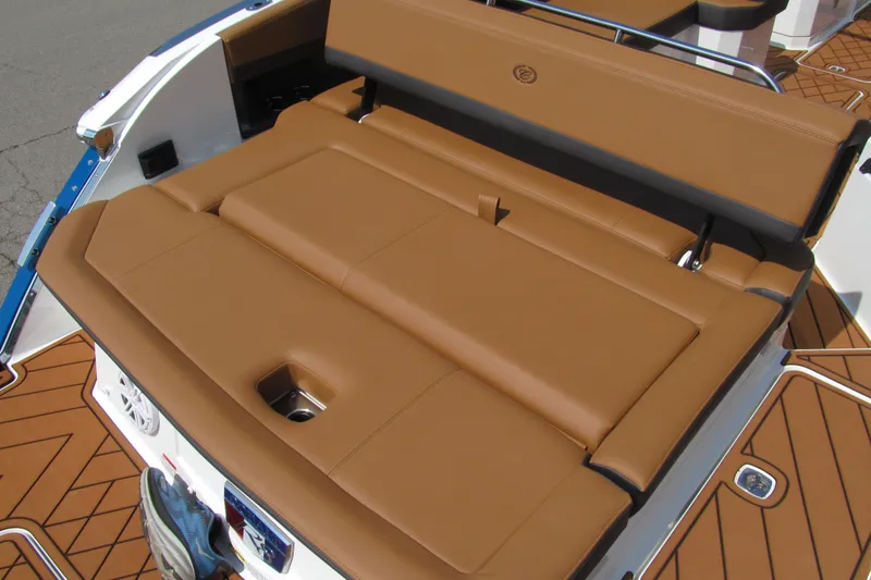 Slide: The Image of 2026 Cobalt R8 boat with tan leather seating and teak-style flooring. - 7