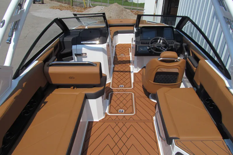 Slide: The Image of Luxurious interior of 2026 Cobalt R8 boat with tan seating and modern dashboard. - 8