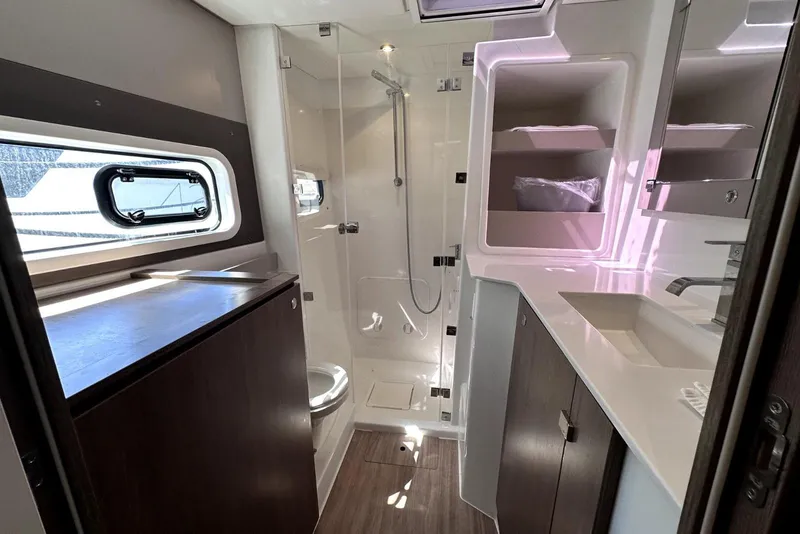 Slide: The Image of Modern bathroom interior of 2023 Bali CATSPACE yacht with shower, sink, and window. - 15