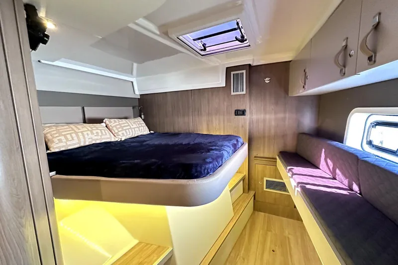 Slide: The Image of Interior of 2023 Bali CATSPACE with bed and seating area. - 23