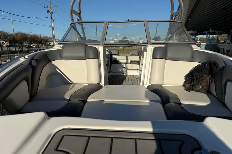 Slide: The Image of Interior view of a 2011 Yamaha Boats 242 Limited S, featuring spacious seating. - 4
