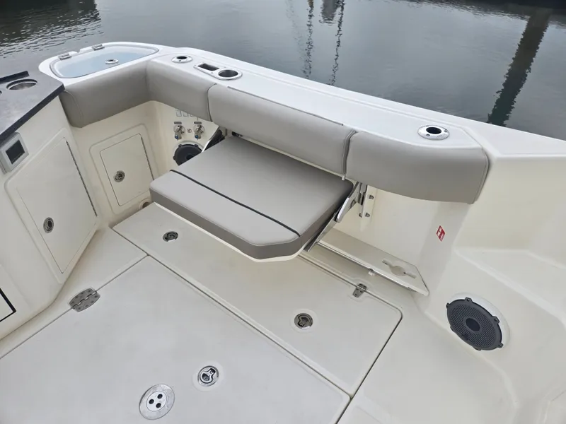 Slide: The Image of 2026 Boston Whaler 365 Conquest with foldable cockpit seat. - 12
