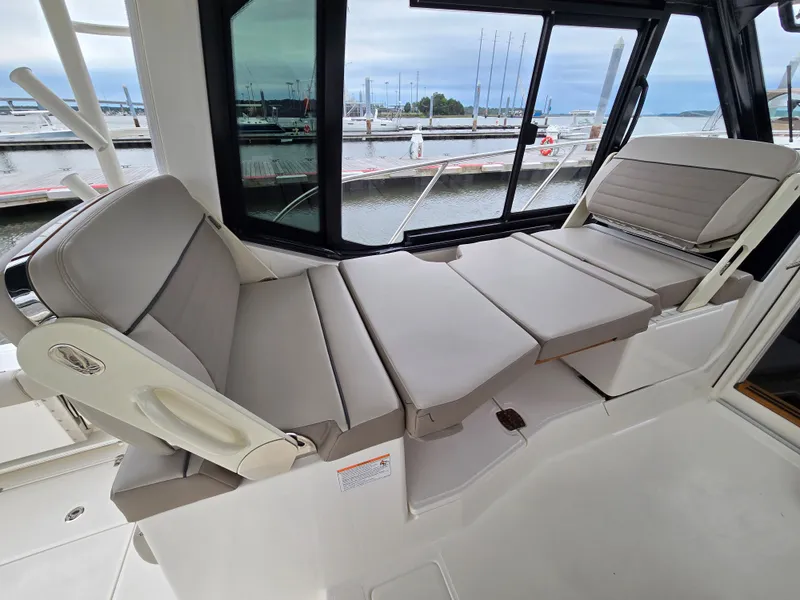 Slide: The Image of Interior of 2026 Boston Whaler 365 Conquest with reclining seat. - 24