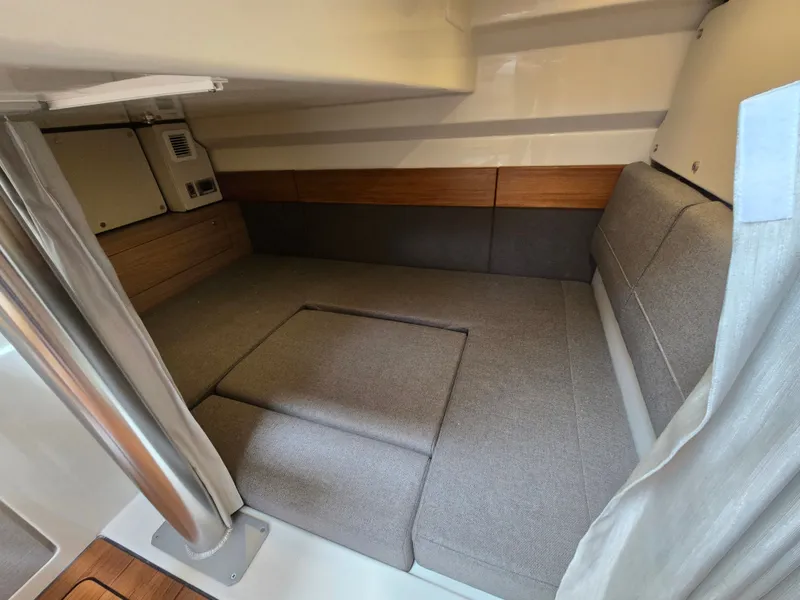 Slide: The Image of Interior of 2026 Boston Whaler 365 Conquest with cozy sleeping cabin. - 41