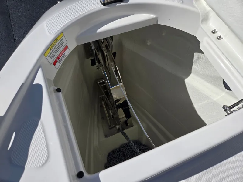 Slide: The Image of An anchor locker on a 2027 Saxdor 320 GTO, featuring chain and windlass. - 29