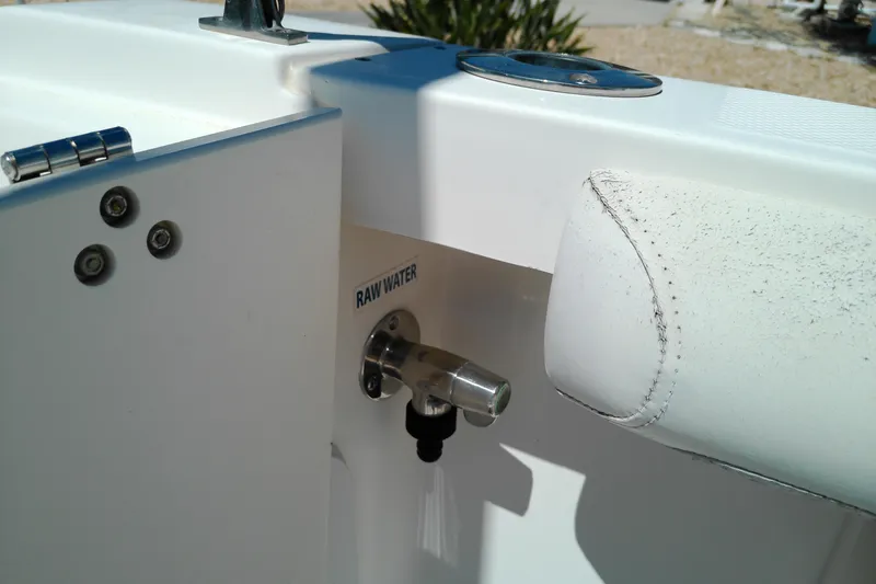 Slide: The Image of Key West 2020 Walkaround boat, 2009 model, featuring a raw water outlet. - 9